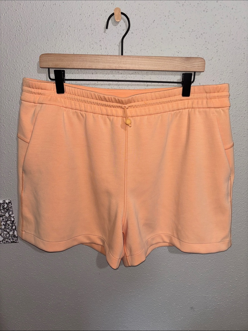 Lululemon - Soft Streme 4” High-Rise Short in Peach Bellini (Size 14)